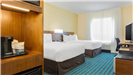 Queen guest room with two beds and complimentary accommodations