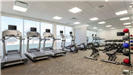 Fitness room with work out machines and weights