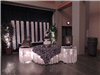 Black and white wedding reception lighted cake table